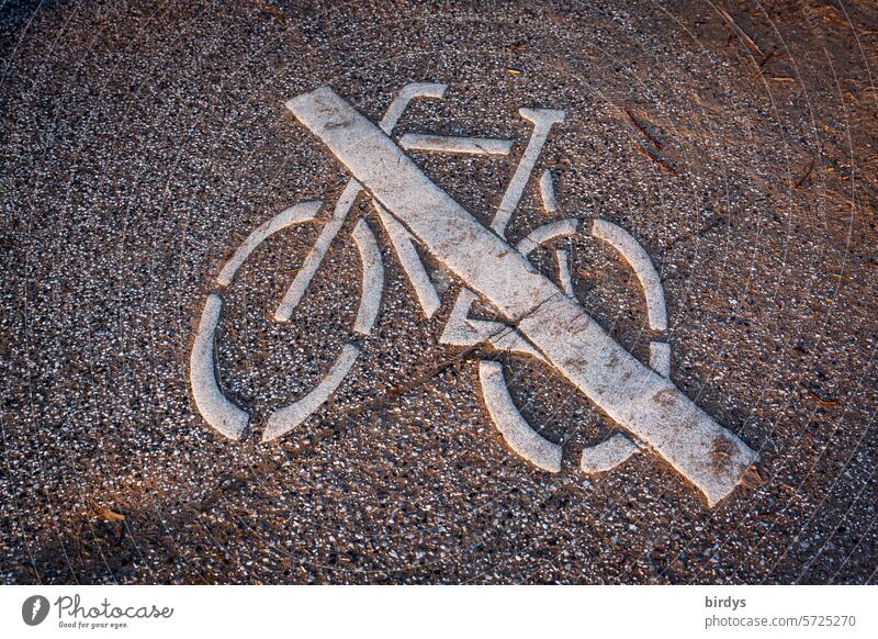 crossed-out, haptic bicycle symbol on asphalt Cycling forbidden Signs and labeling Asphalt Bicycle Lane markings crossed out Clue Neutral background Bicycle ban