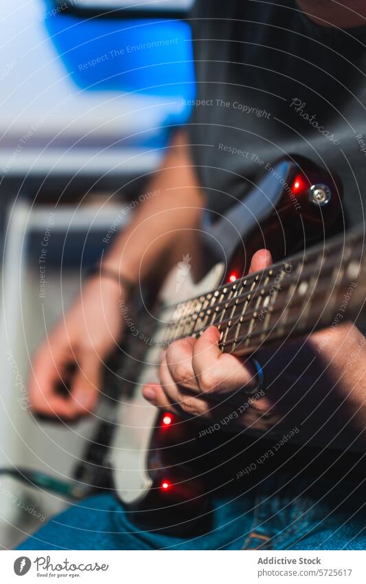 Electric guitar player recording in studio musician electric guitar recording session equipment playing strings frets hands close-up music production sound
