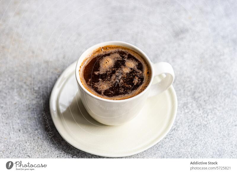 Freshly Brewed Morning Coffee in White Cup on Saucer coffee morning brew cup saucer ceramic white black coffee bubbles drink beverage caffeine fresh tabletop