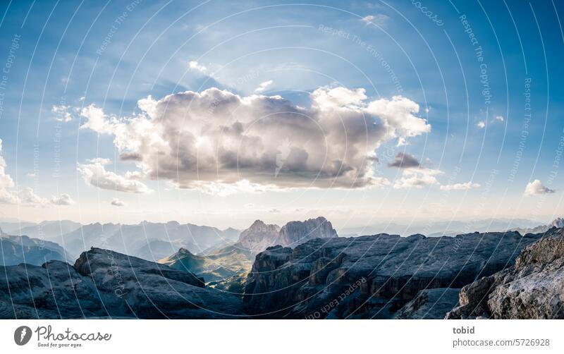 Cloudy view Dolomites Mountain Peak Gorges valleys Summer Beautiful weather Shadow Shadow play outlook Panorama (View) rock Wall of rock Storm clouds Light