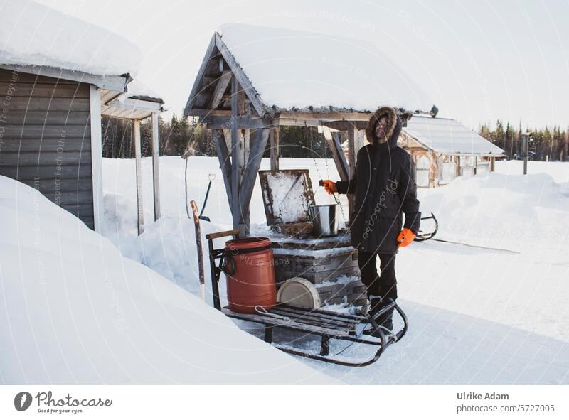 Lapland | Fetching water at the well self-catering sustainability naturally Freedom idyllically Tourism Winter vacation Scandinavia Vacation & Travel Cold