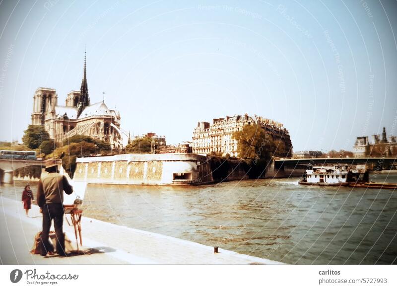 City trips in the 80s | Paris, city of artists ... France Seine Painter Artist Notre Dame Architecture Cathedral Historic Tourism Church Landmark Sightseeing
