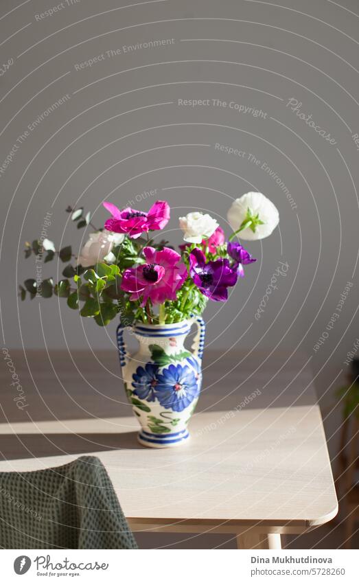 vase with bouquet of pink and purple flowers in ceramic vase on the table. I can buy myself flowers. Happy Birthday or Anniversary. floral florist background