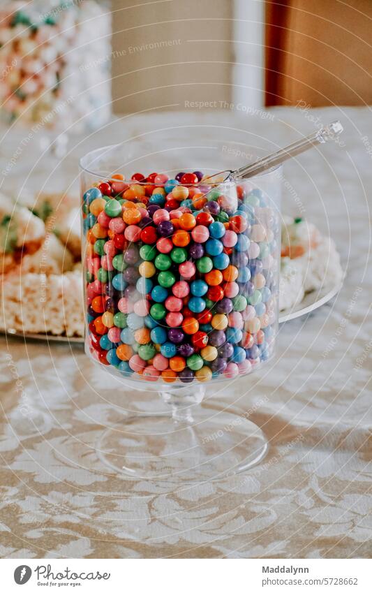 Colorful candy Desert in a glass jar at a party Candy Sweet Sugar Multicoloured Coulored sugar candy Colour photo Food Shallow depth of field Nutrition