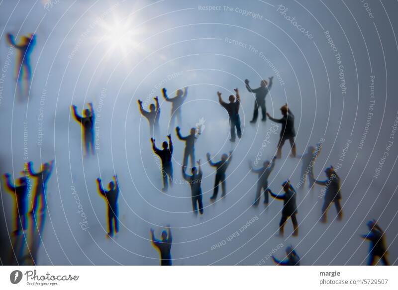Sun worshippers, people (figures) with raised hands in front of the sun Miniature Figures men Sunlight pray arms raised Arms raised Many raised a hand Gesture