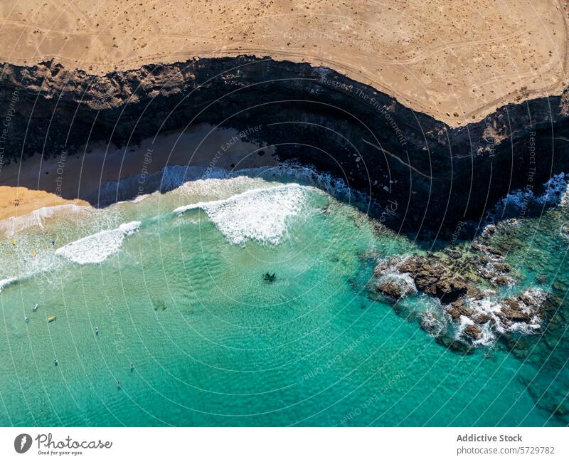 Aerial view of Fuerteventura coastline with turquoise waters fuerteventura aerial view drone image beach cliff sand sea remote tranquil nature landscape travel
