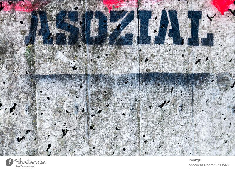 ASOCIAL in solidarity Selfishness egocentric asocial social criticism Society Politics and state Typography Characters Graffiti Wall (building) Black Gray