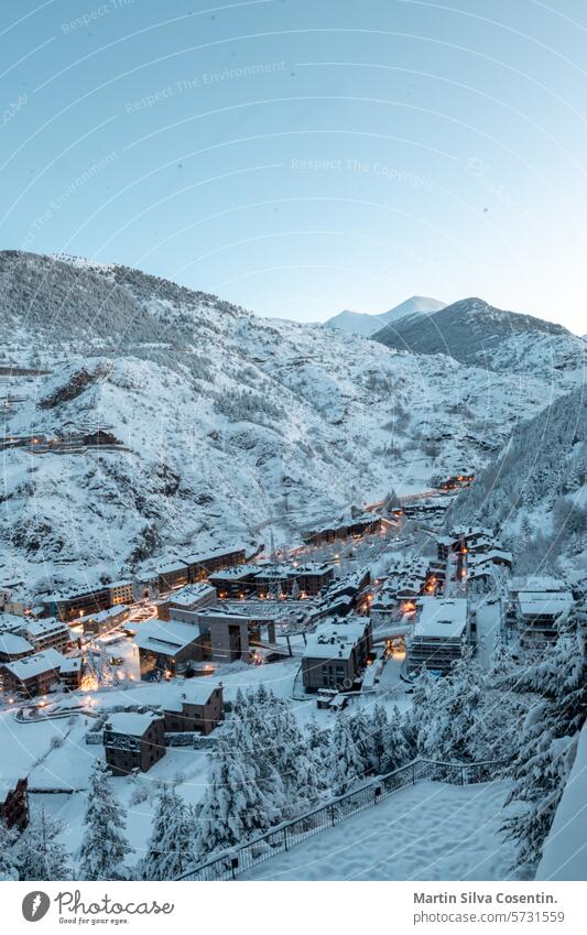Cityscape of the tourist town of Canillo in Andorra after a heavy snowfall in winter alpine alps andorra architecture background beautiful blue building canillo