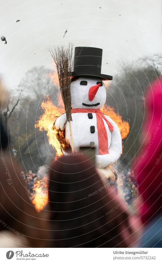 A snowman burns - symbol of the beginning of spring Summer day parade Speyer Life with children Colour photo Exterior shot Snowman Fire Spring can come
