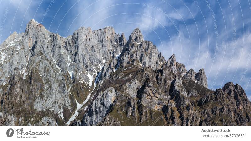 Rugged Peaks of Picos de Europa National Park picos de europa national park mountain peak sky blue rugged majestic rock alpine nature landscape spain spanish