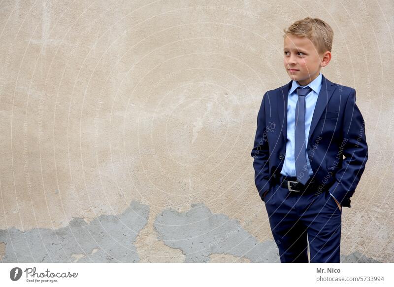 young fashion Lifestyle Suit suit-wearer Tie Hip & trendy Fashion Clothing Elegant portrait Boy (child) Self-confident Easygoing Cool (slang) Chic Style Posture