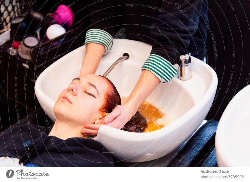 Relaxing Hair Wash at a Professional Salon hair salon hair wash client stylist pampering beauty care shampoo conditioner wash basin relax hygiene personal care