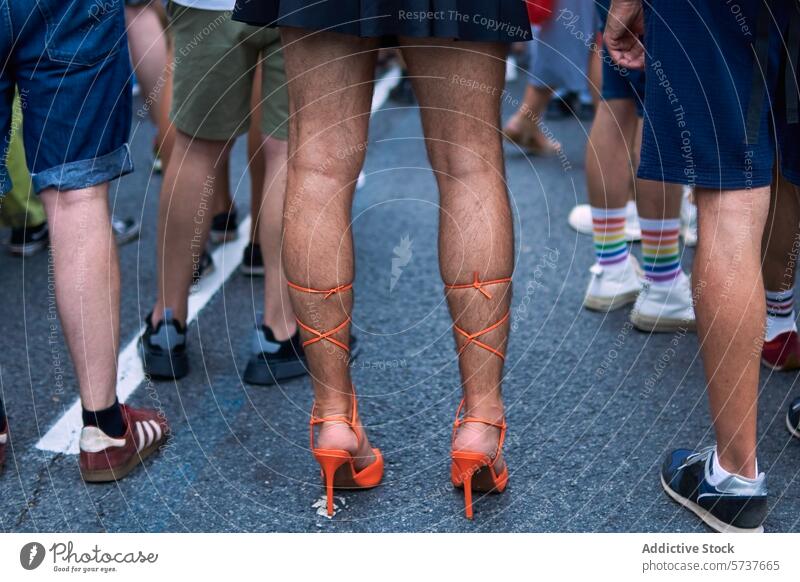 Expressive footwear at an LGBTIQ pride event lgbtiq celebration diversity self-expression high heels orange fashion street parade community inclusion equality