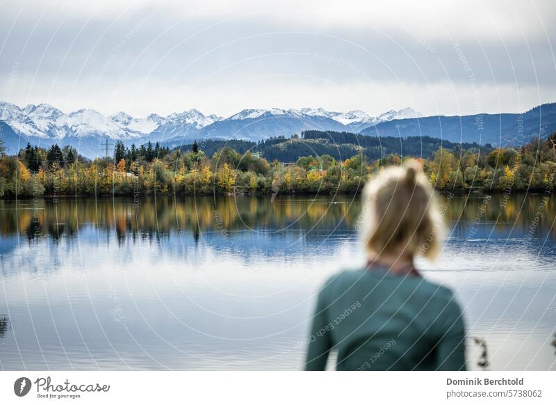 Woman gazing into the distance blurred Body of water Looking Adults mountains Lake Landscape Vantage point Wanderlust Panorama (View) Sky Water Autumn Autumnal