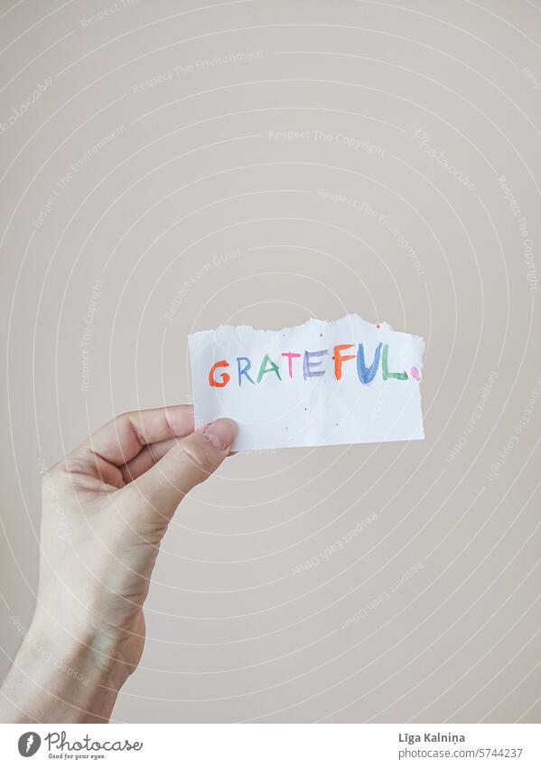 Word grateful Capital letter Typography Signs and labeling Neutral Background Characters Design Grateful Gratitude Thank Hand Paper