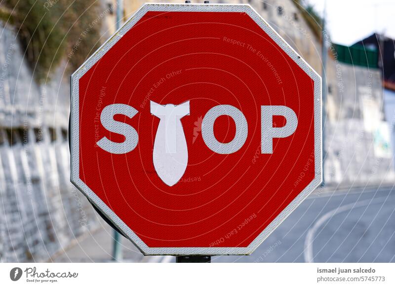 Stop traffic signal on the streetbom stop road asphalt warning city road sign symbol way caution roadsign advice safety outdoors bilbao spain Bomb