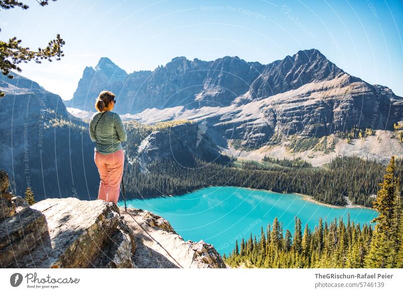 Woman looking down on turquoise lake Lake Canada Water Mountain Rocky Mountains vacation travel Hiking Lake O'Hara forests Vacation & Travel Landscape