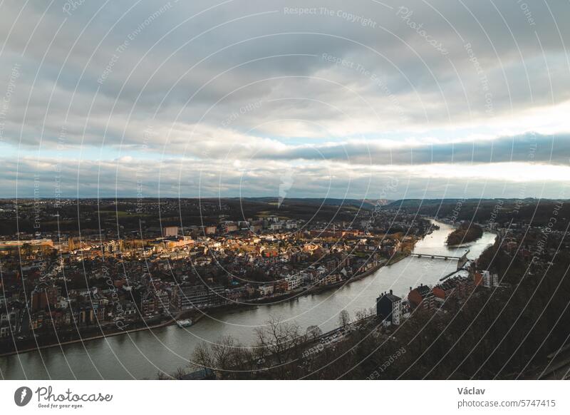 View of the town of Namur at sunset. The capital of the Wallonia region in Belgium namur belgium roof hill tower water panorama gothic castle exterior urban