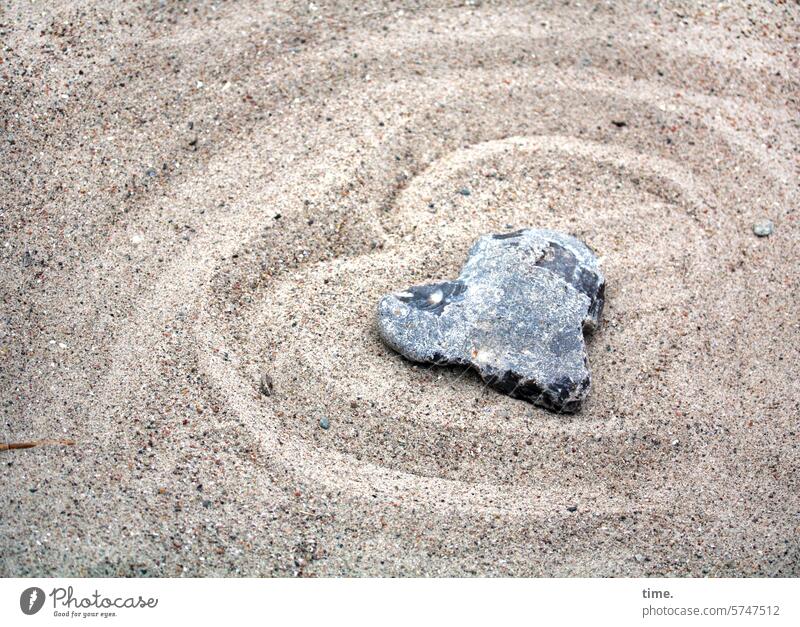 Heart in the sand Stone flint Sand Beach heart-shaped Mulde Drawing border Clue Exposed Discovery Nature lines