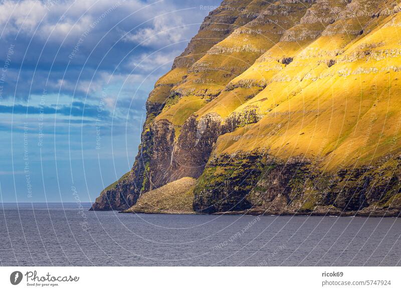 Rocks on the Faroe Island Kalsoy färöer coast Ocean atlantic ocean Northeast Atlantic Atlantic coast Denmark mountain cliffs steep coast Landscape Nature Water