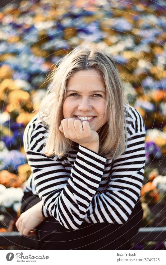 hello spring flowers Flower meadow variegated Young woman Woman 18 - 30 years Blonde Nose ring Chin up Smiling cheerful salubriously fortunate youthful