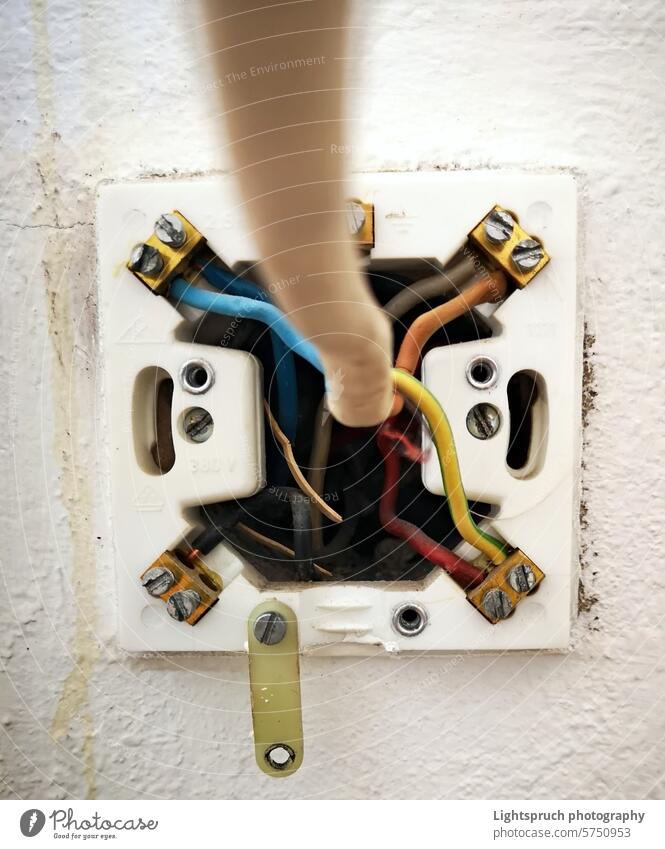 Electrical Soclet Being Fittted Electricity Domestic Life Electrical Outlet Power Line Cable Residential Building Electrician Installing Electric Plug