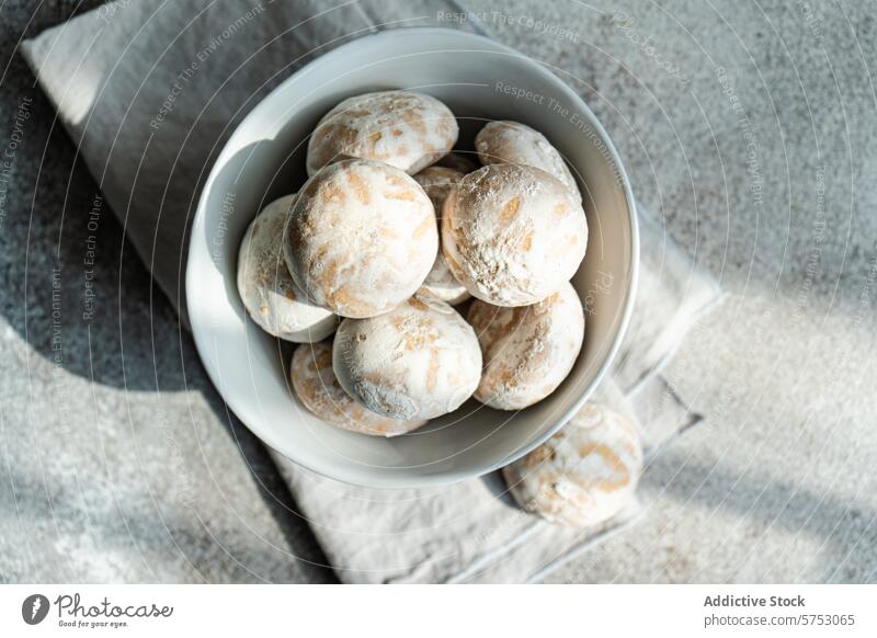 Powdered sugar cookies in a white bowl powdered sugar dessert sweet baked food snack treat traditional homemade pastry confectionery bakery dusted ceramic