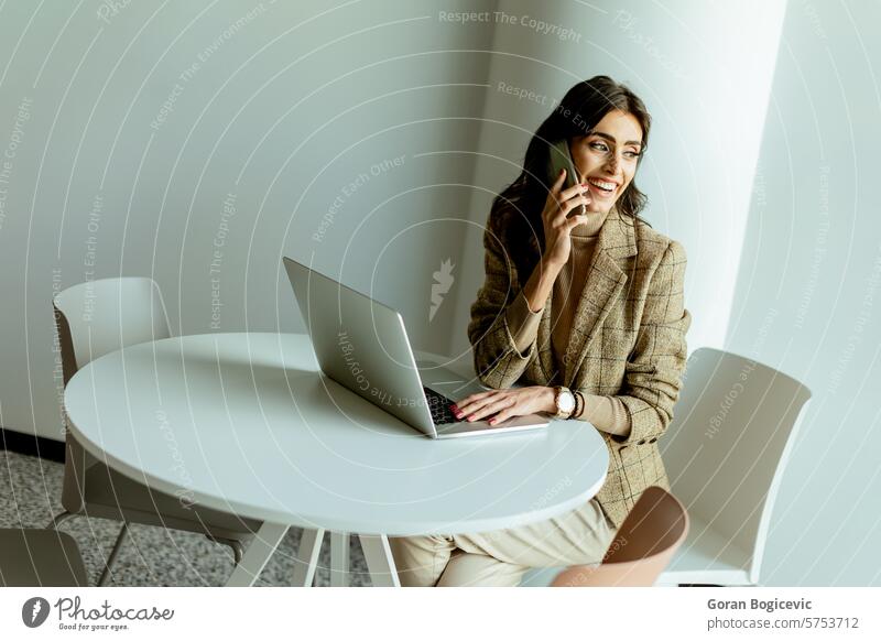 Pensive Professional Woman Engages in Deep Thought at a Bright Office Space. alone attire bright business businesswoman calm career concentration contemplation