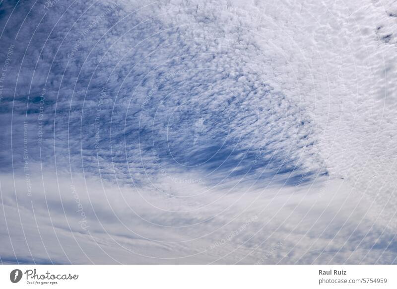 Blue sky full of white clouds, sunny day color image environment outside blue sky negative space vertical nobody environmental future copy space possibility
