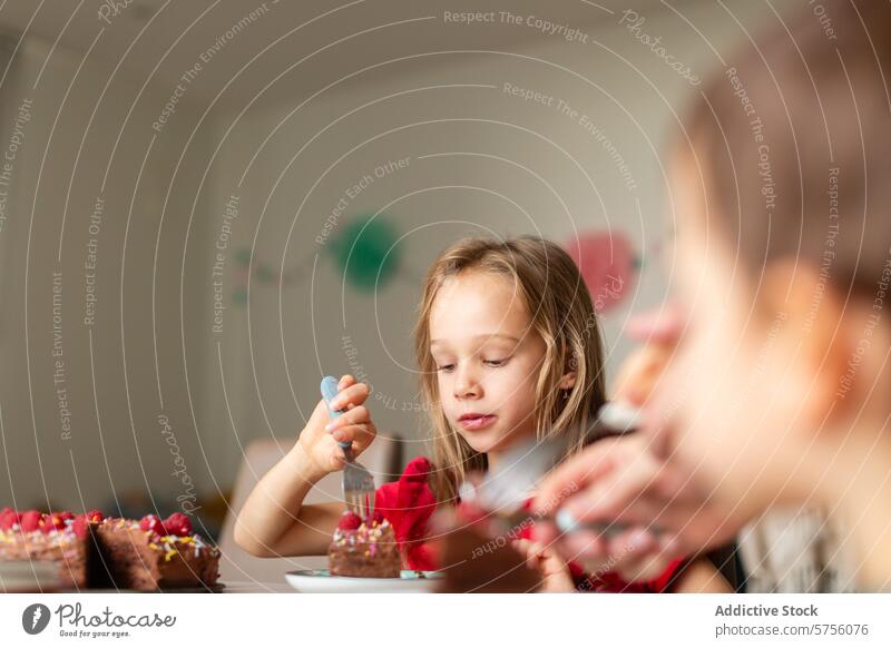 Young girl enjoying a slice of birthday cake child eating party celebration dessert festive plate blond hair focused enjoyment treat young kid decoration sweet