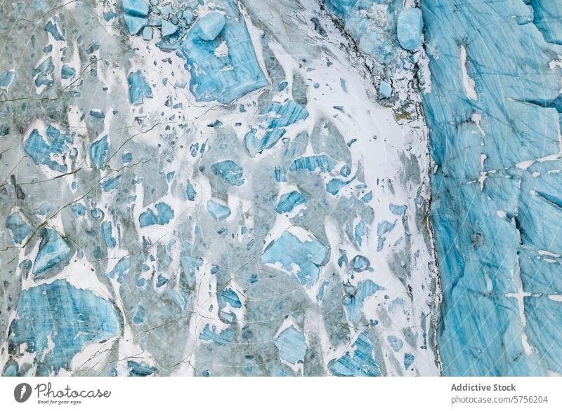 Aerial view of Icelandic glacier textures and crevasses aerial iceland natural beauty geological feature pattern blue hue landscape environment cold climate