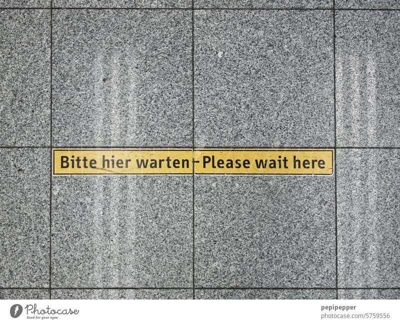 Please wait here sign Signs and labeling Signage Clue Characters Letters (alphabet) Deserted Exterior shot Warning sign Warning label Safety Colour photo