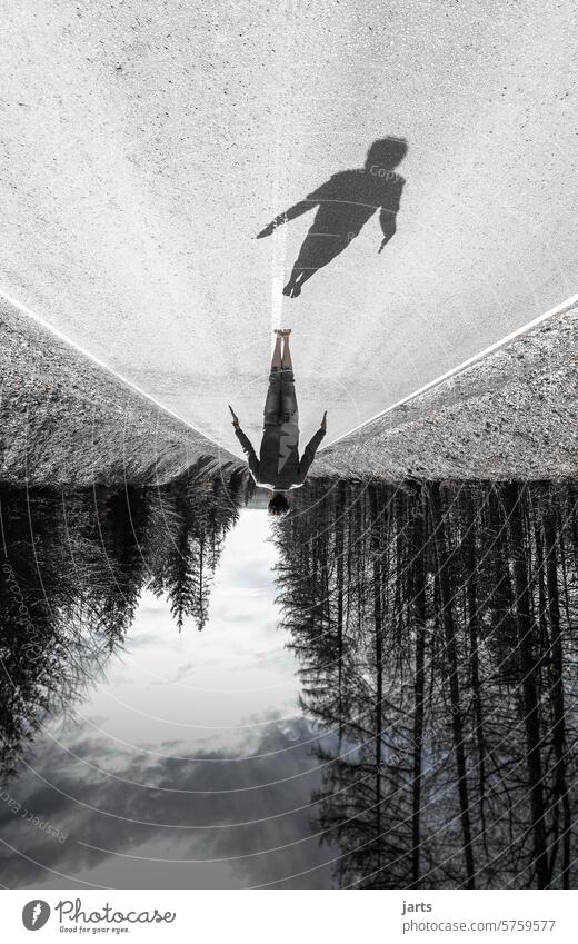 Shadow Jump jump Street Above Under Life Death Sky beyond Light Forest inversely Take off - Activity Exterior shot Copy Space bottom Black & white photo Ease