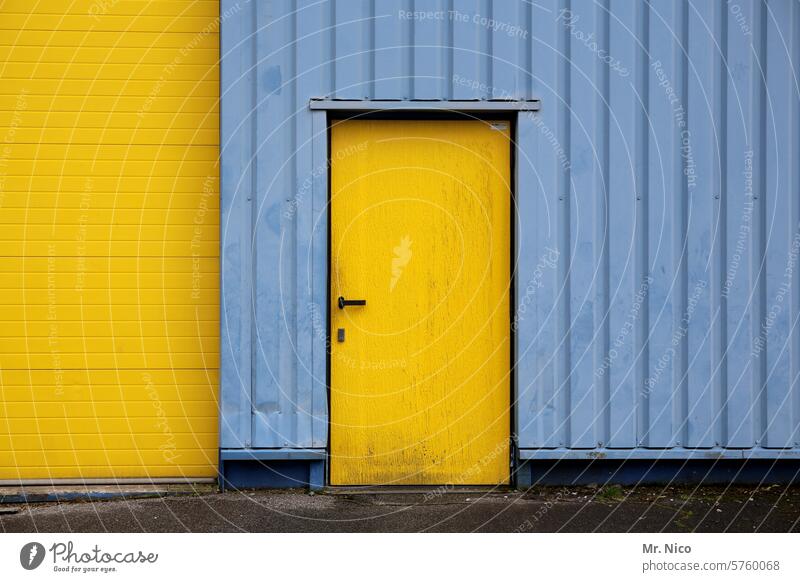 gate and door Depot Warehouse Yellow Building Goal Facade Logistics Rolling door Closed Stock of merchandise Corrugated sheet iron Factory hall Entrance