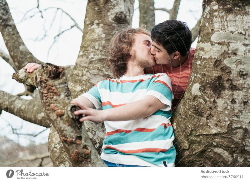 In a heartfelt embrace, one man kisses the other on the mouth, symbolizing love and connection in a peaceful natural setting couple cheek tree nature outdoors