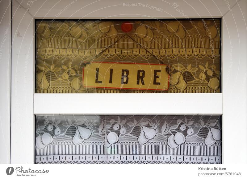 libre can be read in the window Free Empty vacant Open sign door Window Skylight Curtain lace curtain Clue info Entrance unmanned Sign