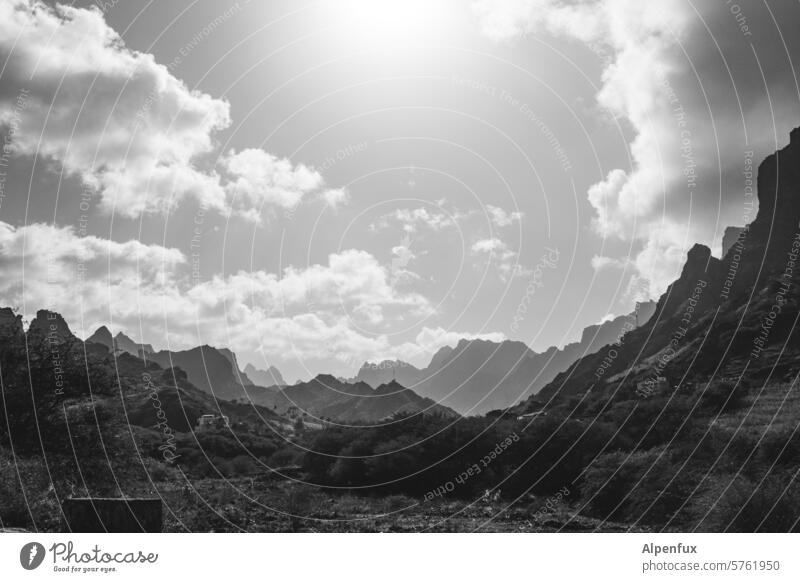 Range of hills volcanic rock Landscape Volcanic Nature Mountain Vacation & Travel Rock Back-light Sky Clouds Black & white photo Panorama (View) Peak