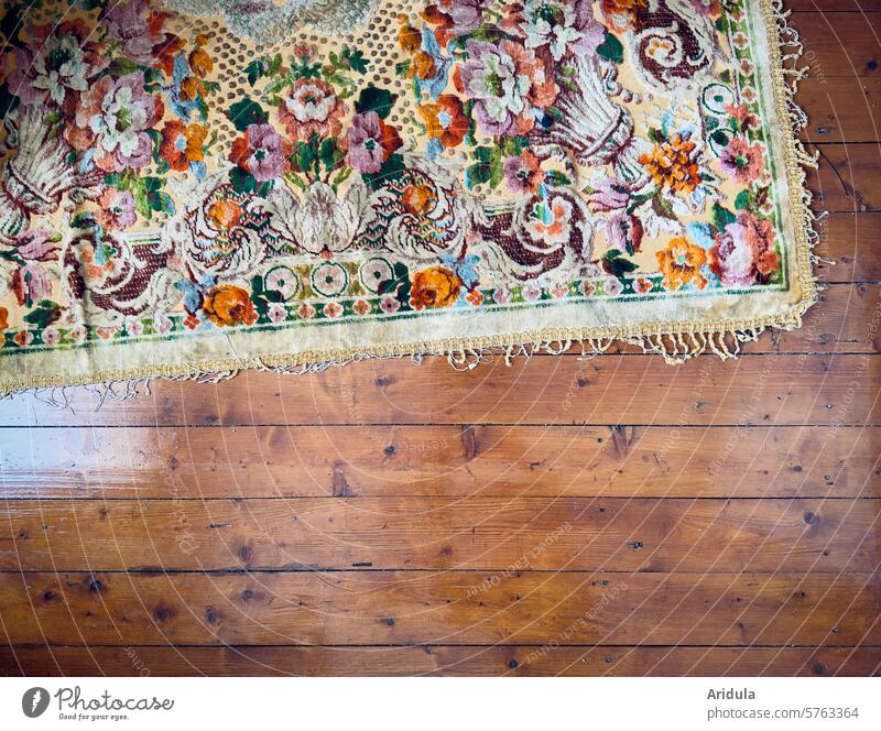 Colorful floral carpet on parquet flooring Carpet flowers Pattern wood parquet Parquet floor Interior shot Living or residing Flat (apartment) Room Wood
