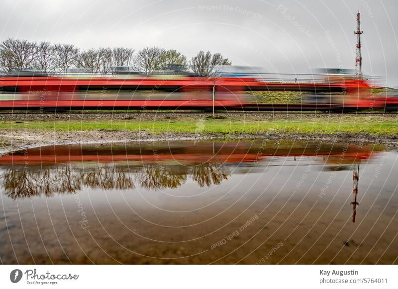 Mirror effect Water reflection Puddle Rain puddle Puddles photography Track train connection Train services railway line Surface of water Puddle sensor Nature