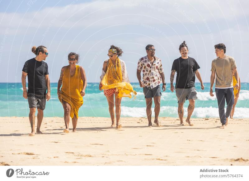 Multiethnic group of friends walking on the beach sand sea leisure sunny men women diverse multiethnic multiracial vacation summer coast shoreline ocean outdoor
