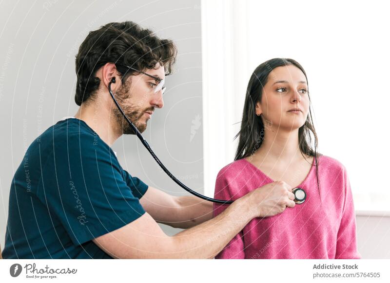A focused doctor conducts a stethoscope exam on a female patient, a routine part of a thorough medical check-up examination heart lung healthcare listening