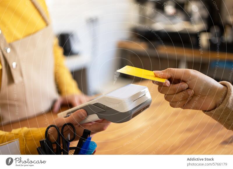 Contactless card payment at a modern cafe contactless customer terminal technology convenience transaction point of sale retail business finance electronic