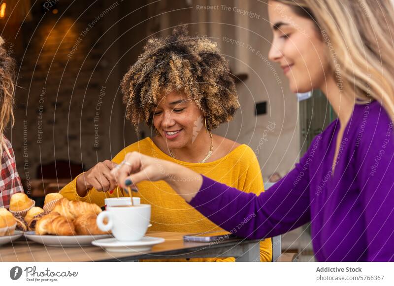Friends enjoying coffee and pastries at a cafe friend pastry laughter sharing good time cozy setting group fresh socialize bakery table casual meeting