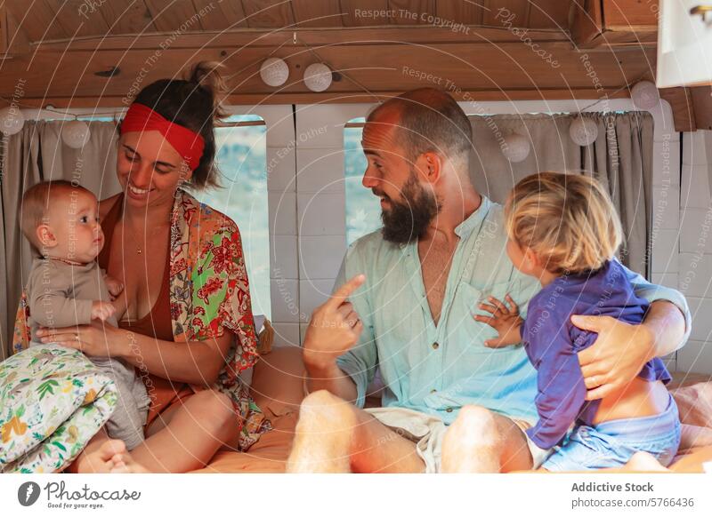 Family Living Full-time in Customized Van with Home Amenities family van life nomadic lifestyle home deck custom full-time living joyful travel freedom
