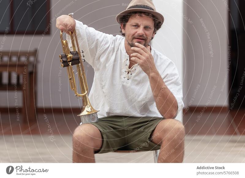 Determined musician practices trumpet outdoors trumpeter one-armed determination passion casual clothing holding man shorts adaptation ability individual