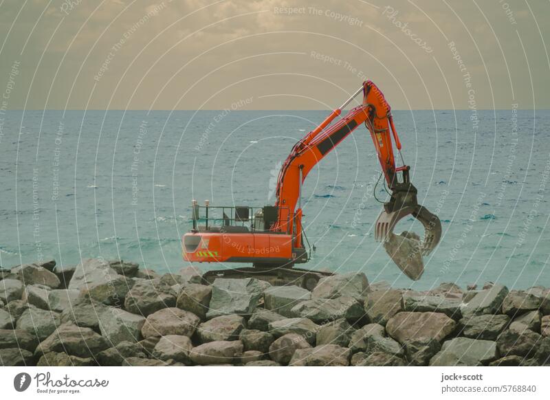 senk ju for treweling I Excavator moves stone for breakwater Pacific Ocean Beautiful weather Queensland Australia Panorama (View) Environment coast