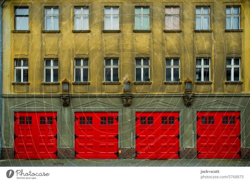 time-honored fire station Facade Building Fire department Garage Closed Window Goal Style Symmetry Highway ramp (exit) Weathered Red Neuruppin Brandenburg