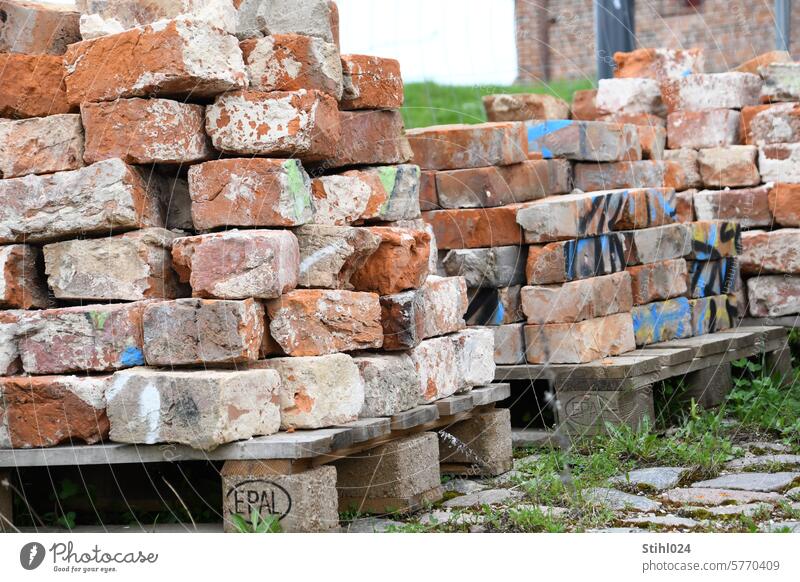 lots of recycled bricks on pallets Brick Recycling Building material Historic Euro Pallet Stone Brick red Cobblestones Construction site House building