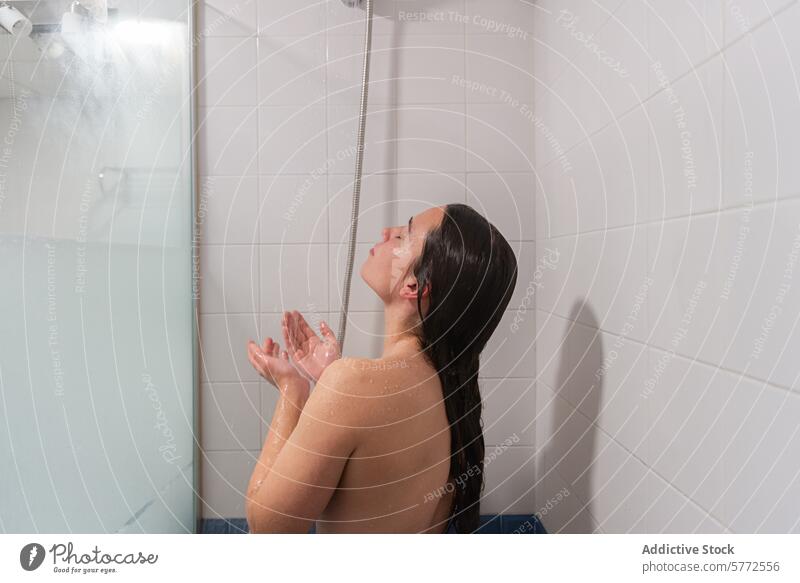 Refreshing Shower Time Captured Under Water Spray person shower water relaxation bathroom hygiene face hair wet refreshment cleansing tiles interior