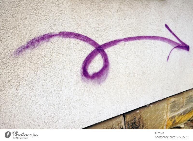 boldly painted purple arrow with a squiggle on a house wall Arrow whorls Spirited Direction arrowhead Graffiti Colour Blog Lifestyle Creativity Design